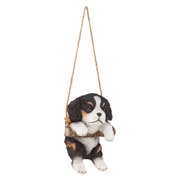 Picture of King Charles Cavalier Puppy On A Perch Hanging